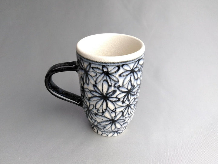 Blue cylindrical Tea Cup with Flowers and handles - Crafted By Kikaku Pottery