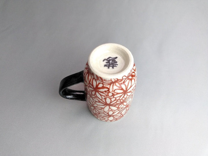 Red cylindrical Tea Cup with Flower handle - Crafted By Kikaku Pottery